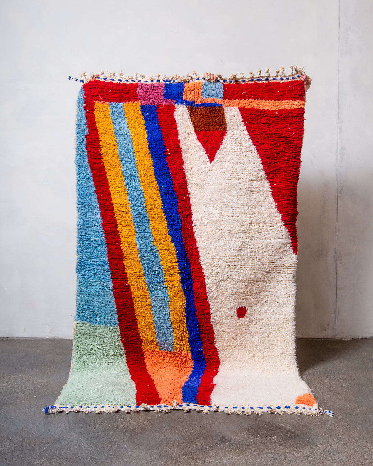 Modern, designer, handcrafted Berber rug from Morocco. Beniourain carpet with beautiful colours and patterns and fluffy wool texture.